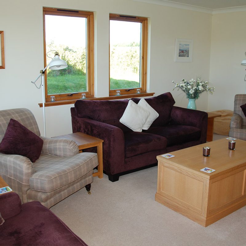 The living room at An Innis holiday accommodation on Islay