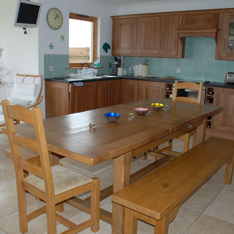 The kitchen and dining area at An Innis holiday accommodation on Islay